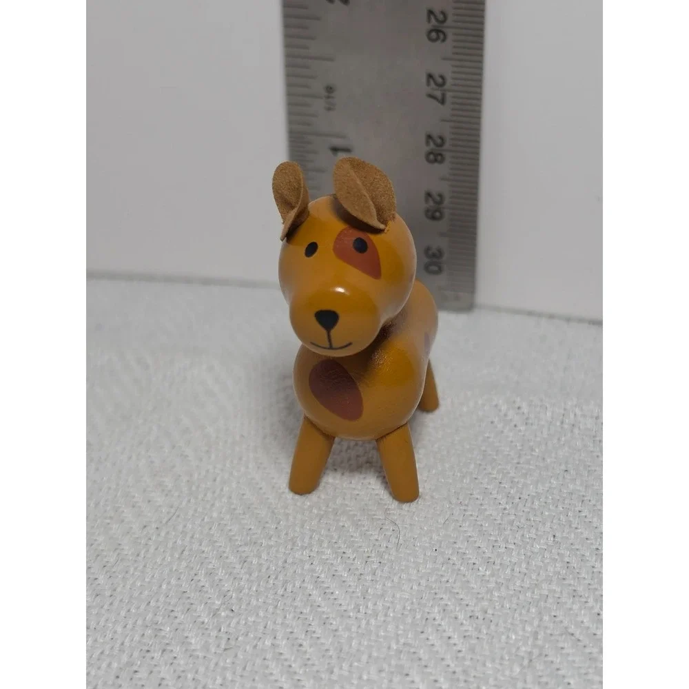 vintage 1960s dime store wooden dog figurine featuring‎ leather ears and painted